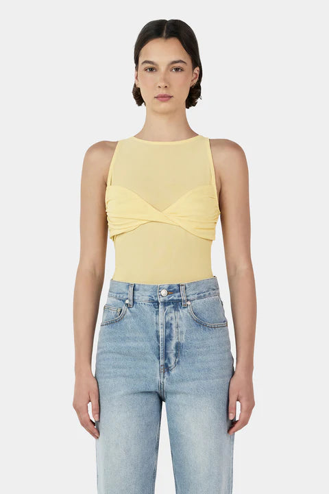 Ownley Halsey Mesh Top in Lemon — the Halsey Mesh Top is a sleeveless top with a sheer mesh bodice and a lined bra detail over the bust.