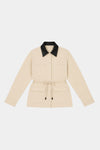 Beige Idris Jacket laid flat on a white background, showing the black contrast collar, long sleeves, front closure, patch pockets and detachable waist tie