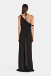 A rear view of a black maxi dress featuring a halter tie at the neck, an open back, an asymmetrical bodice and a sheer full-length skirt.