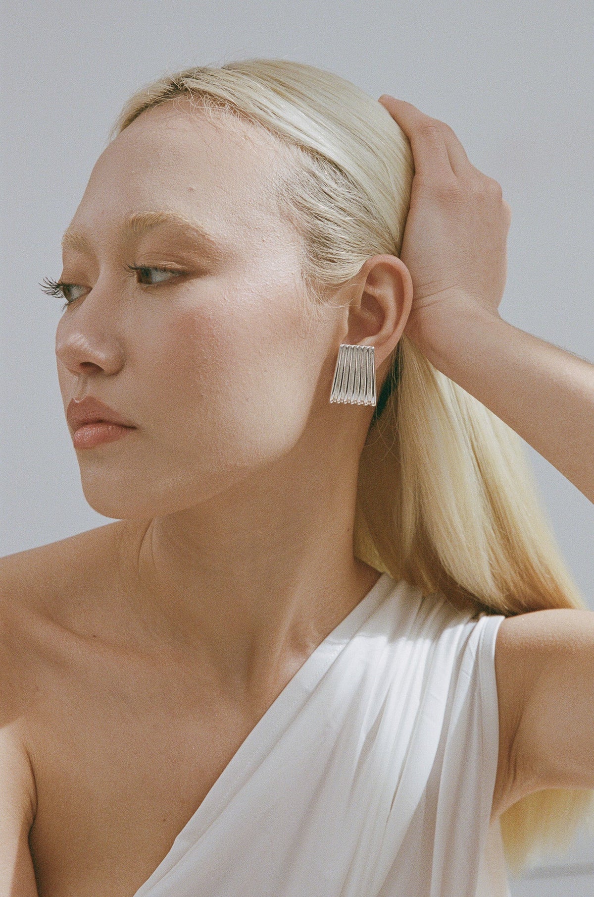 Porter Caterpillar Earrings in Silver — caterpillar Earrings are Porter's sculptural take on statement studs — a bold, textured silhouette designed to make an easy style statement.