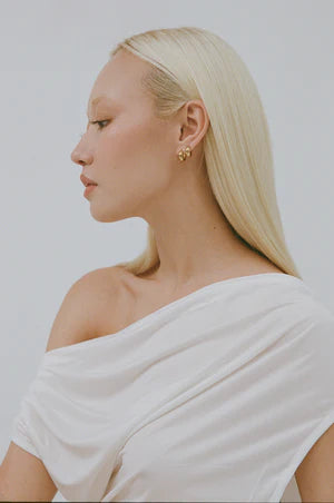 Porter Petite Thick Huggies 8mm in Gold — petite Thick Huggies 8mm are Porter's dainty everyday hoop essential — a compact, huggable design built for effortless stacking.