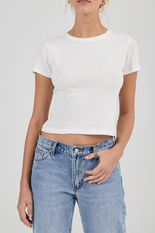 Rolla’s Classic Tee in Vintage White, cropped front view on model.
