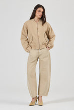 Rolla’s Dune Bomber Jacket in Dune, full-length styled front view.

