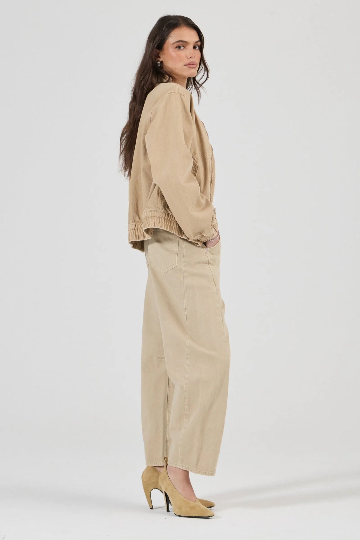 Rolla’s Dune Bomber Jacket in Dune, angled side view on model.
