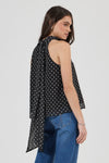 Rolla’s Edie Halter Top in Polka Dot, angled back view showing the neck tie.
model.
