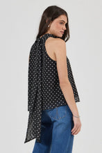 Rolla’s Edie Halter Top in Polka Dot, angled back view showing the neck tie.
model.
