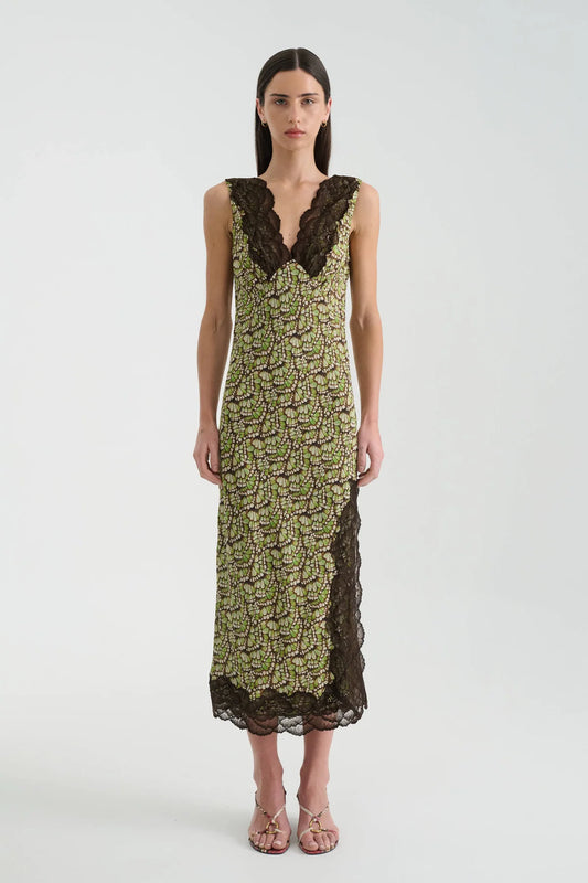 Front view of the Papillon midi dress featuring a green, cream and brown print, a plunging V-neckline with dark lace trim, sleeveless styling and a scalloped lace hem.