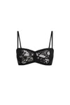 A black botanical lace bralette displayed against a plain white background, featuring thin adjustable shoulder straps, intricate floral lace panels, a softly shaped front, a fitted under-bust band and delicate scalloped edging.
