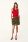 Rowie Marina Silk Mini Skirt in Olive — a feminine mini with a fluid, body-skimming silhouette, the Rowie The Label Marina Silk Mini Skirt in Olive is beautifully cut on the bias for an elegant drape.