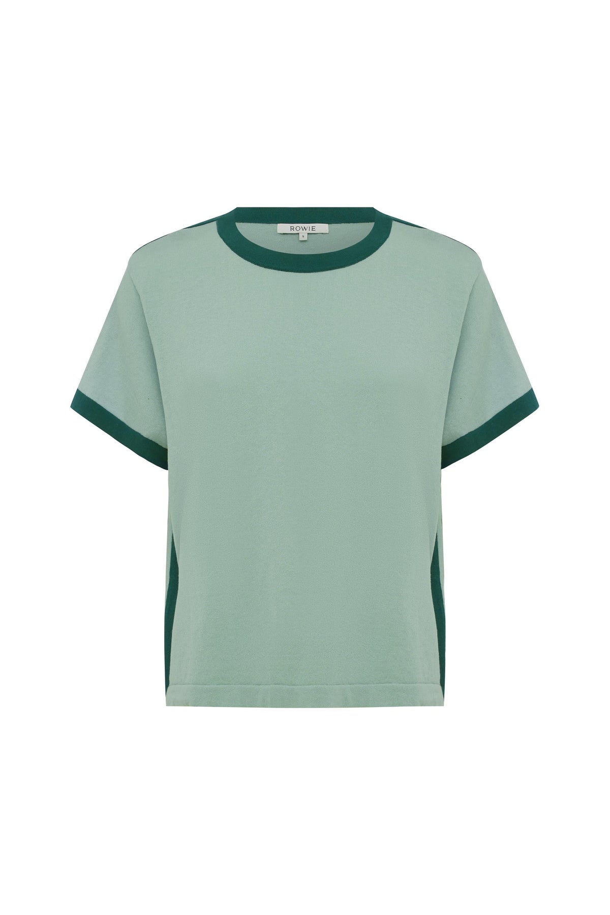 A pale green short-sleeve knit tee with dark green contrast neckline, cuffs and side detailing is shown from the front.
