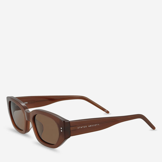 Brown rectangular sunglasses with brown lenses shown from a three-quarter side angle on a white background.