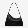 Status Anxiety Reverie Bag in Black — the Reverie Bag in Black by Status Anxiety is an easy statement piece with a clean, sculptural shape.