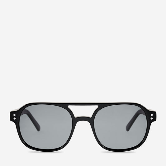 Status Anxiety Subliminal Sunglasses in Black, front product view showing the rectangular frame, rounded edges and dark lenses.