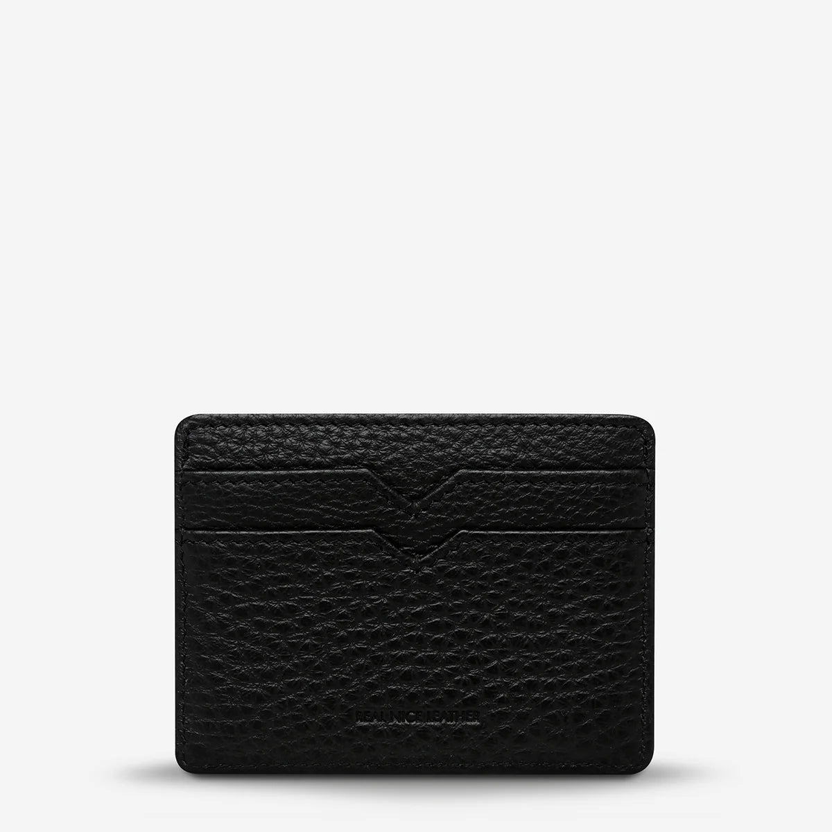 Status Anxiety Together For Now Wallet in Black — crafted from soft, shrunken pebble leather, this sleek cardholder combines durability with refined style.