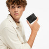 Status Anxiety Together For Now Wallet in Black — crafted from soft, shrunken pebble leather, this sleek cardholder combines durability with refined style.