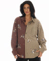 The Tales Embellished Half N Half Stripe Shirt in Brown — RESTOCK NOV The Tales Embellished Half N Half Stripe Shirt brings a playful twist to classic shirting with its contrasting stripe design and statement embellishment details.