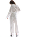 The Tales Frida Lace Hem Floral Pants in White — the Tales Frida Lace Hem Floral Pants offer an elevated take on relaxed tailoring with delicate lace trim detailing and an effortless silhouette.