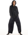 The Tales Harajuku Pin Stripe Tuxedo Wool Pants in Black — the Tales Harajuku Pin Stripe Tuxedo Wool Pants combine classic tailoring with a relaxed modern silhouette.
