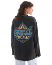 Close back view showing the colourful Keep It Coming graphic and relaxed oversized shape against a white studio background.