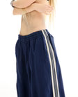 The Tales The Harajuku track Pant — the Harajuku Track Pant by The Tales Contemporary Unisex wide leg track pants with contrast stripe tape.