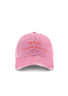 Front product view of the pink trucker cap highlighting the curved embroidered slogan and distressed detailing against a white background.