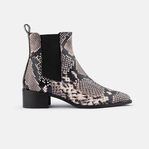 Carina Boot by DOF Studios, this style features a snake embossed print, a classic slightly pointed boot with block heel. The Carina is a classic shape that will take you through the seasons.
